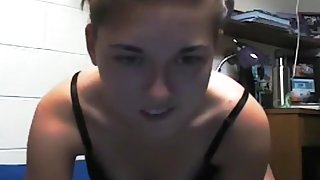 Student plays with her small tits and rubs her shaved pussy in her dorm